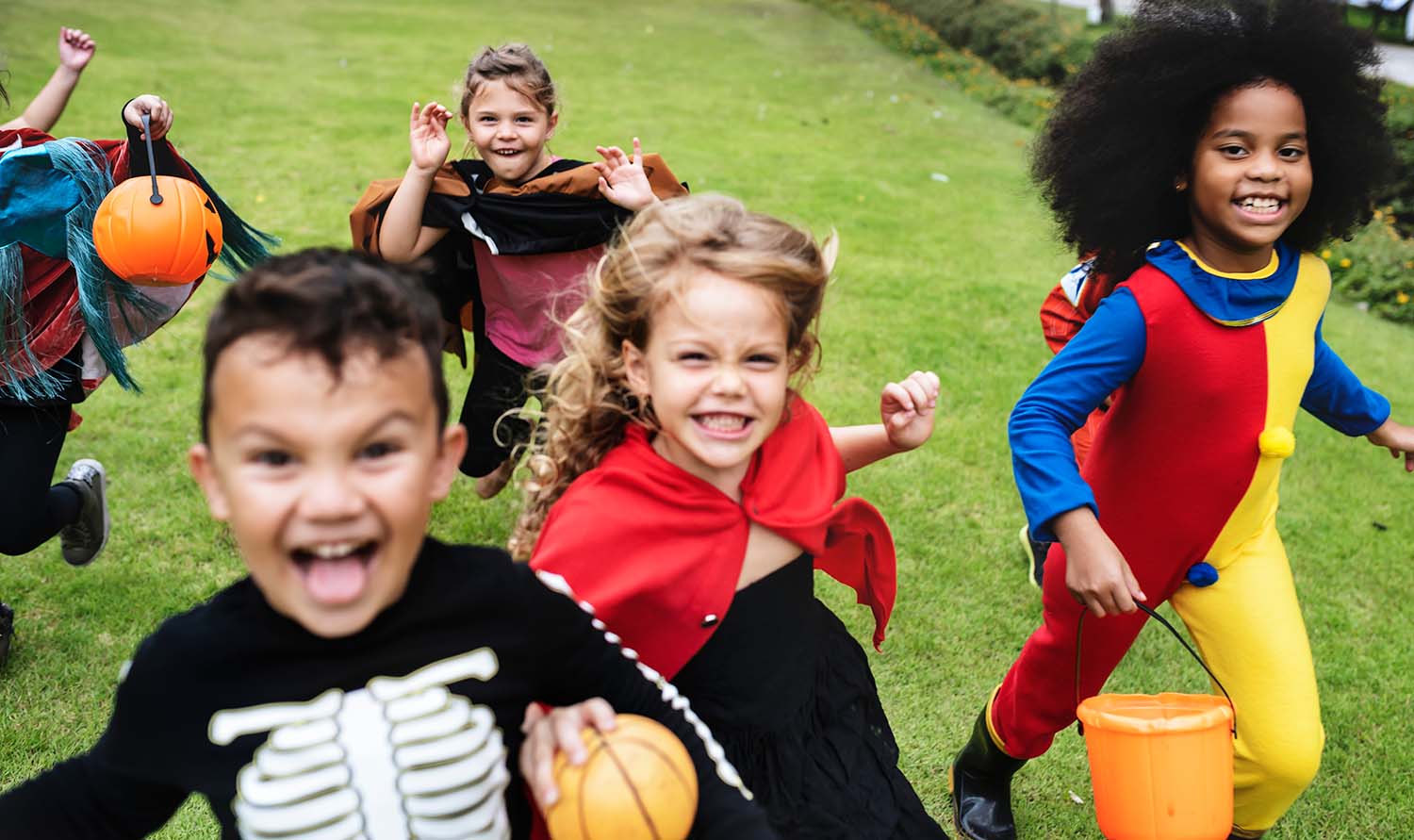 Photo of children in Halloween costumes at a Halloween party.