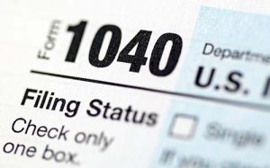 Image of Federal income tax form 1040. Free tax help is available at the libraries this tax season.