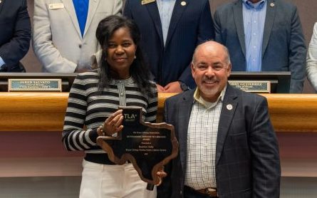 Bea Saba, front left, is honored by Bryan Mayor Bobby Gutierrez and the other members of the Bryan City Council on May 2.