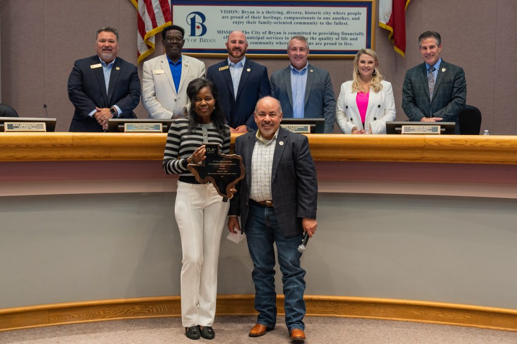 Bea Saba, front left, is honored by Bryan Mayor Bobby Gutierrez and the other members of the Bryan City Council on May 2.