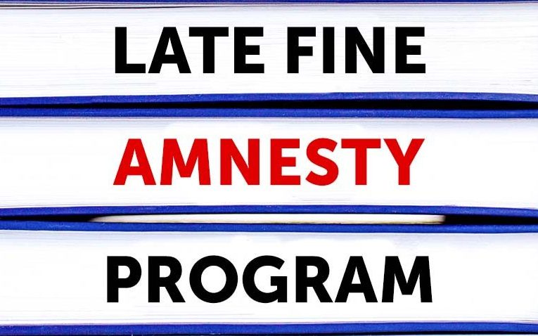 Illustration of books that says Late Fine Amnesty Program.