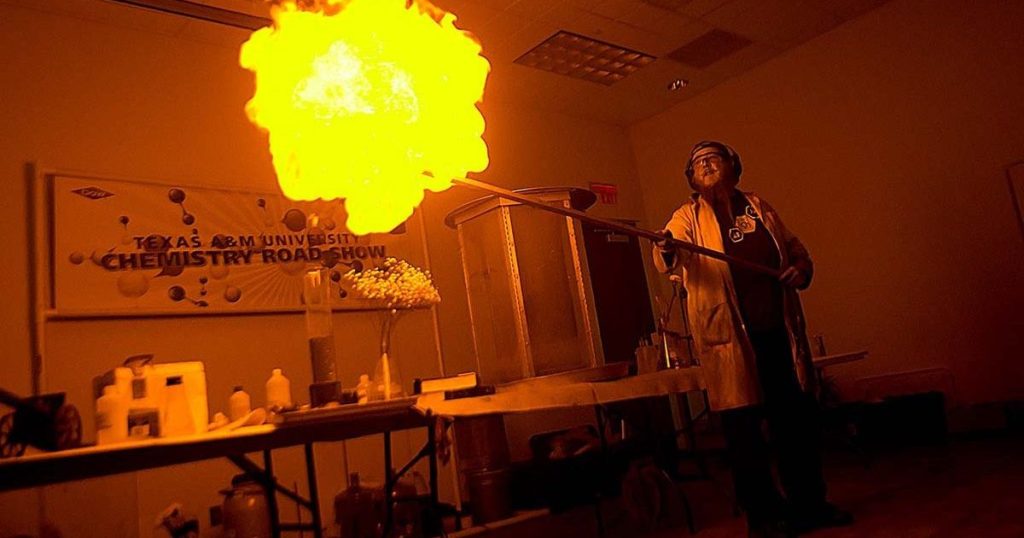 A chemistry student creates a fire tornado from a giant ball of flame at the Texas A&M University Chemistry Road Show.