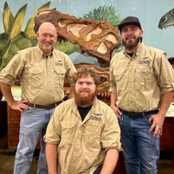 group photo of the Dinosaur George staff